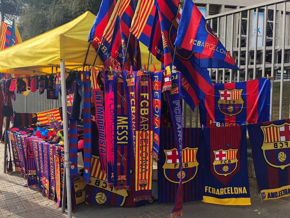 FC Barcelona scarves displayed at a street stall