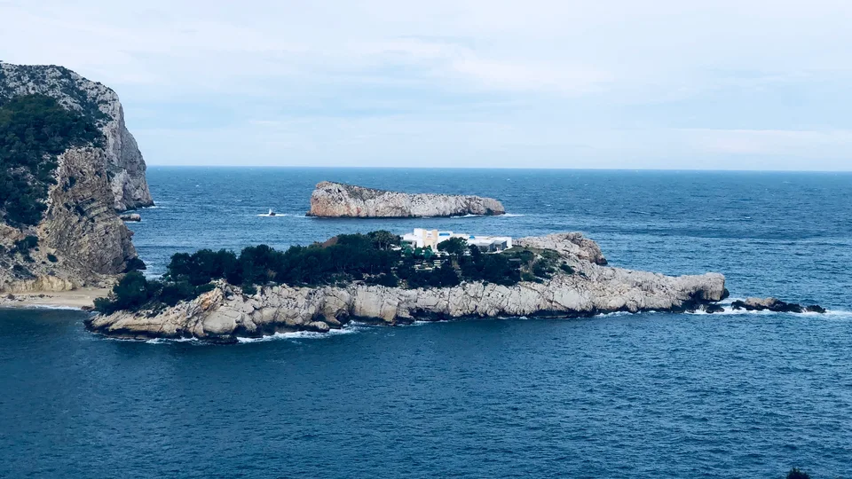 Rocky Ibiza coastline and blue Mediterranean water