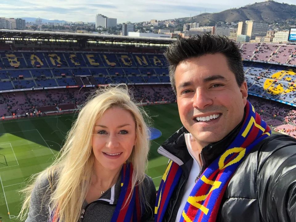 Alex and Kristin wearing scarves in the Camp Nou stands