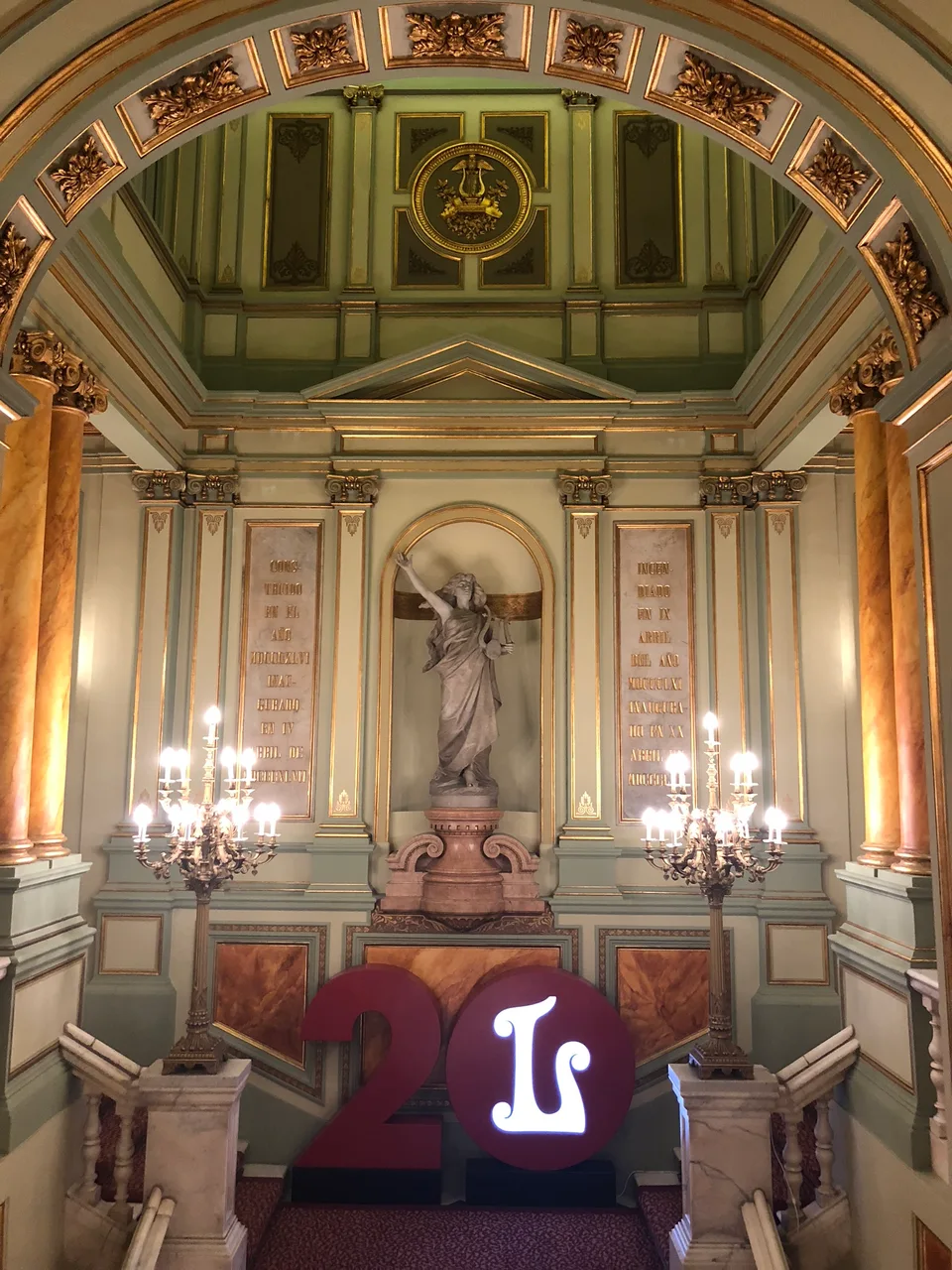Chandeliers and decorated ceilings in the Liceu foyer
