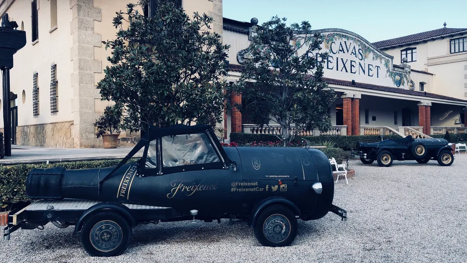 Freixenet’s building and a black bottle-shaped promotional car