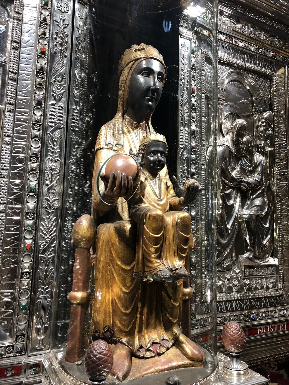 The dark Madonna and Child of Montserrat in their ornate shrine