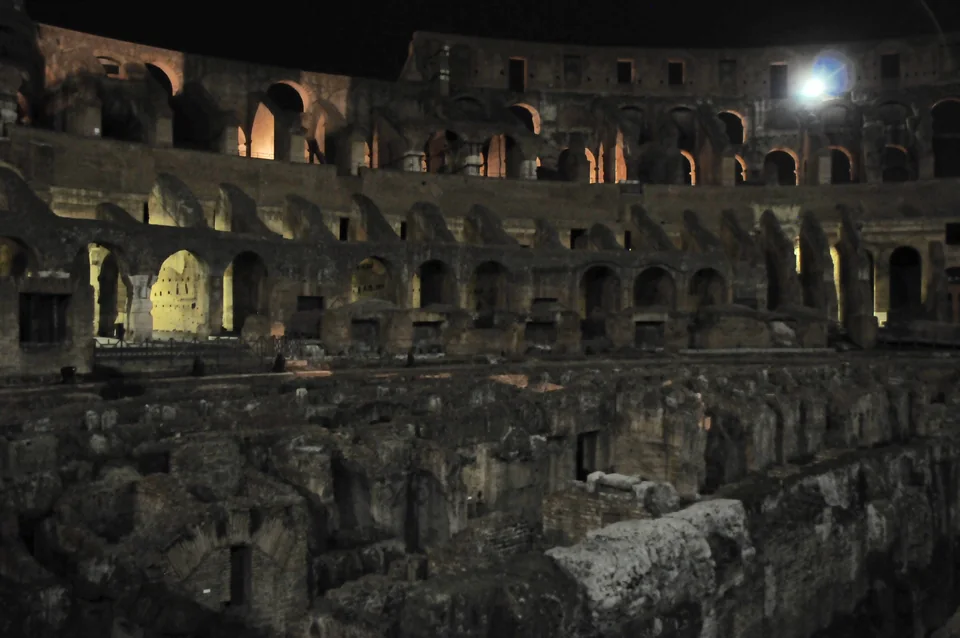 The interior structure of the Colosseum lit at night