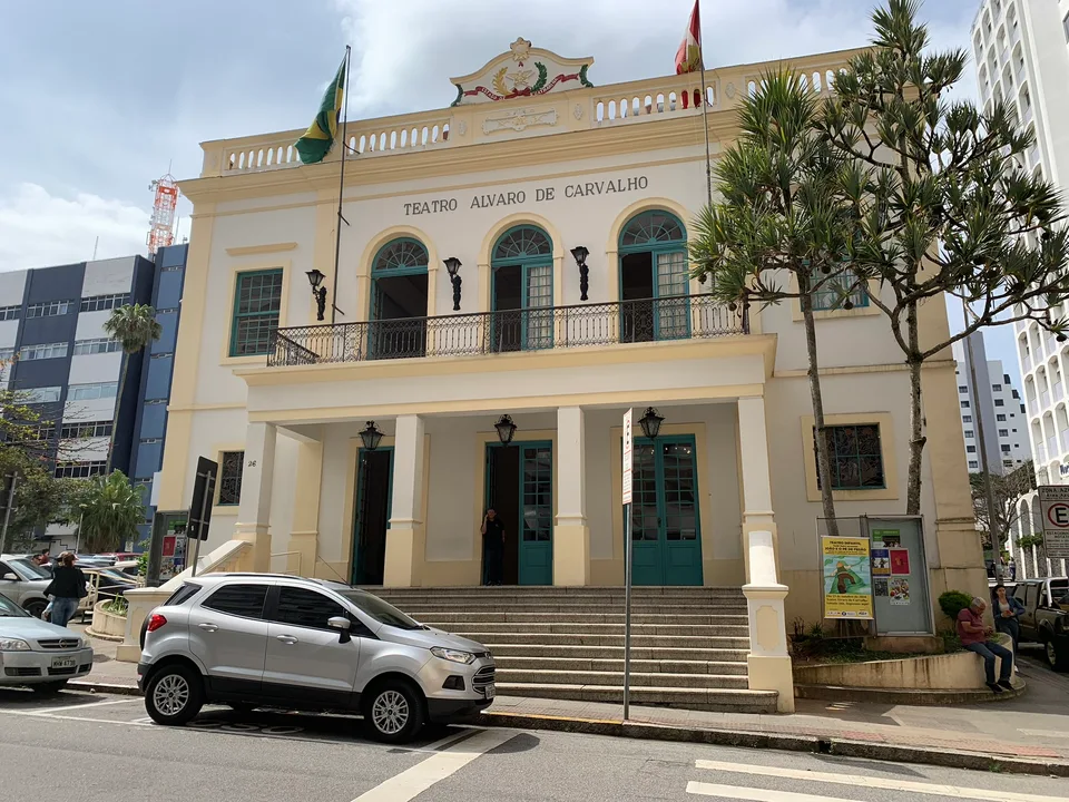 A yellow historic façade with arched windows in central Florianópolis