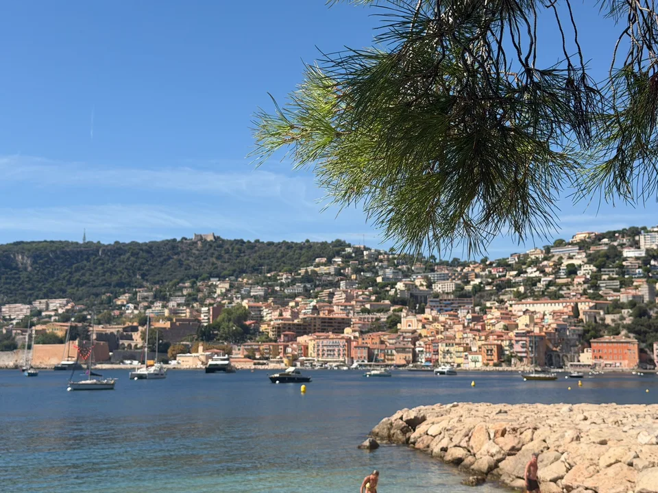 Villefranche’s curving bay beneath a clear blue sky