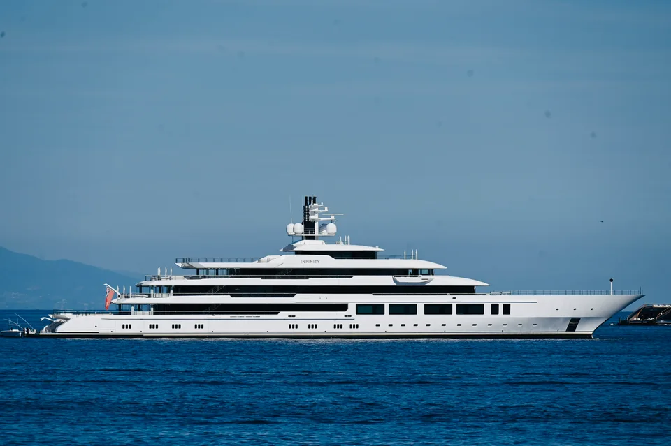 A large white yacht offshore on the Mediterranean