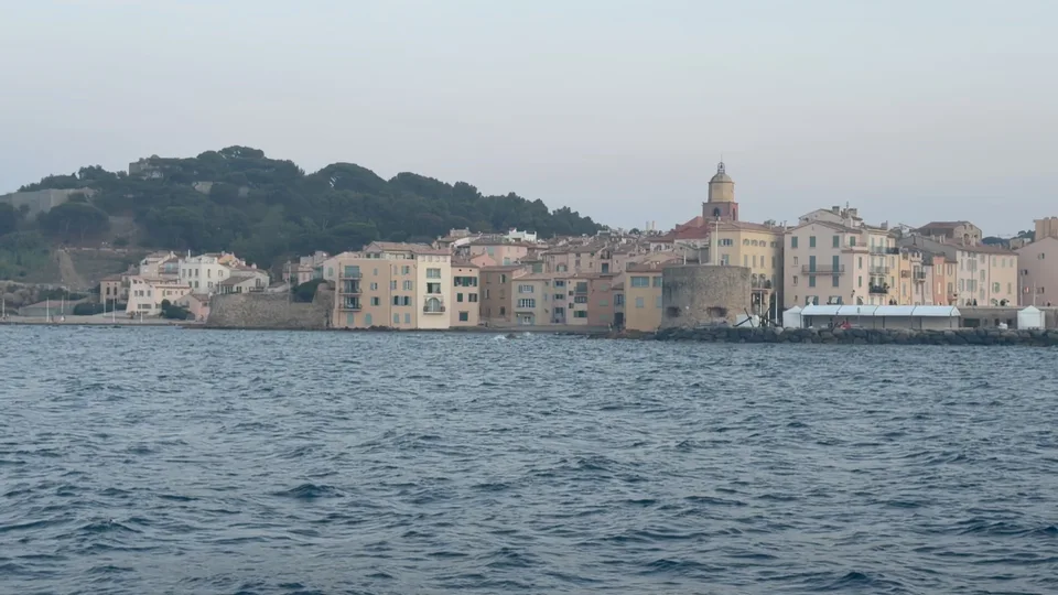 Saint-Tropez’s bell tower and waterfront seen from the sea