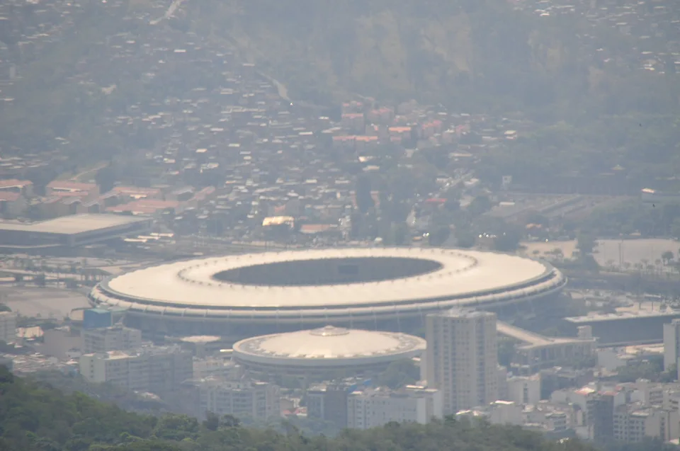 The oval Maracanã stadium among Rio’s buildings seen from above