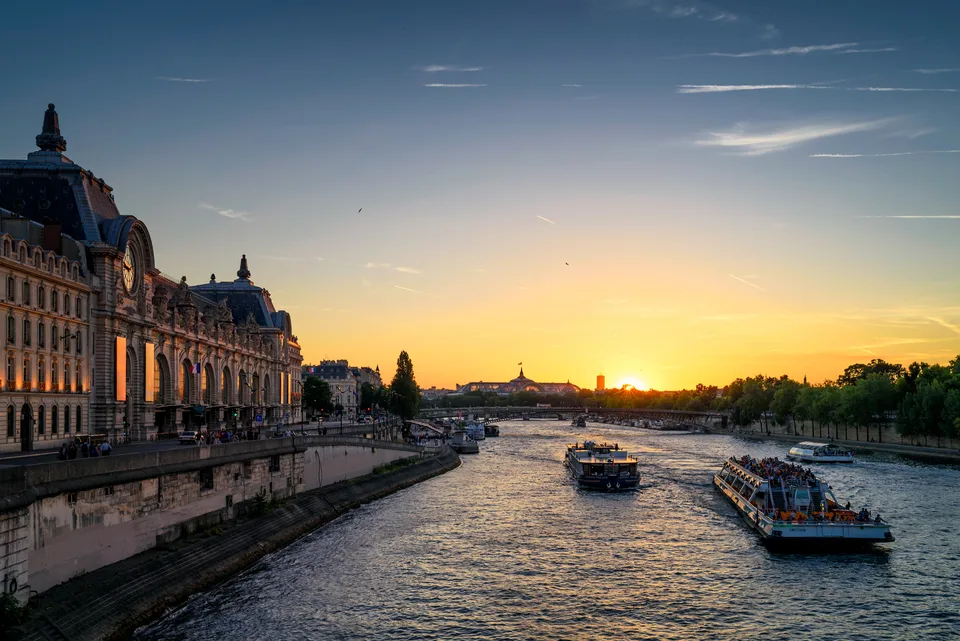 The Musée d’Orsay beside the Seine in warm evening light