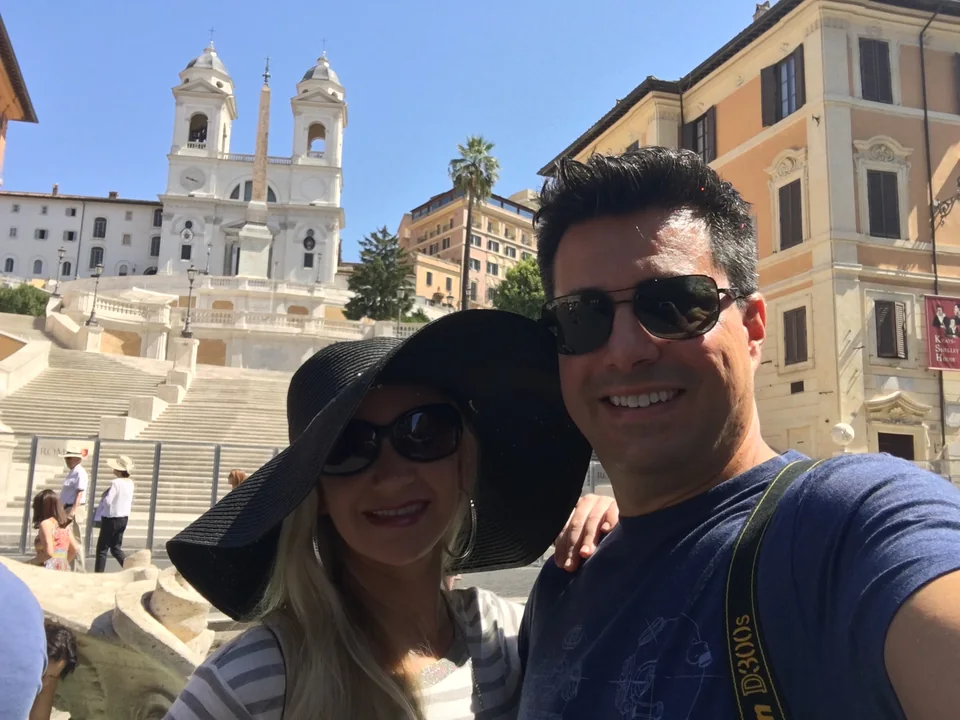 Alex and Kristin taking a photograph in front of the Spanish Steps